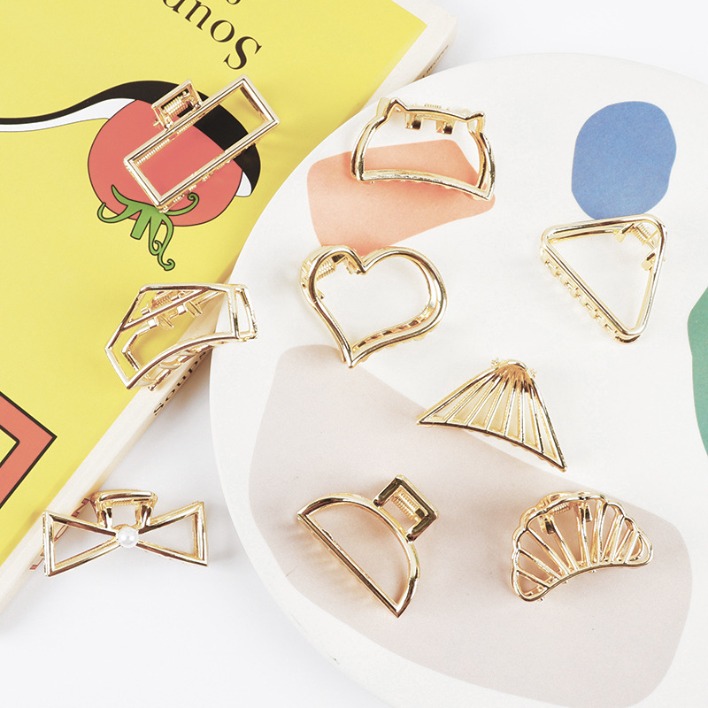 Gold 6138 - Kleine minimalistische haarklauwclips metallic goud uitgehold